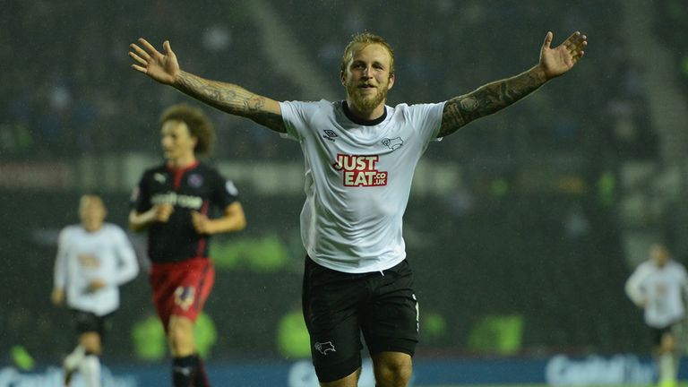 Johnny Russell of Derby celebrates 