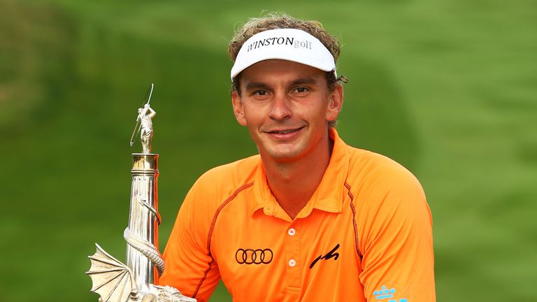 NEWPORT, WALES - SEPTEMBER 21:  Joost Luiten of the Netherlands poses with the trophy following his victory on day four of the ISPS Handa Wales Open at Cel