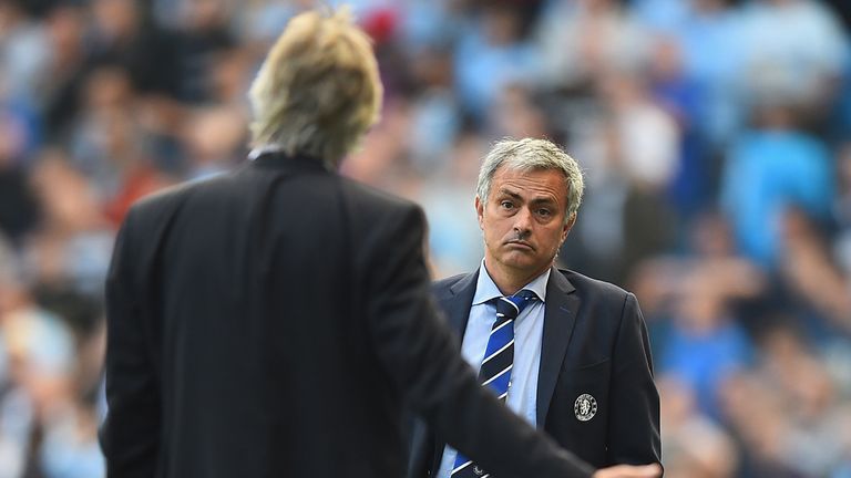 Jose Mourinho speaks with Manuel Pellegrini 