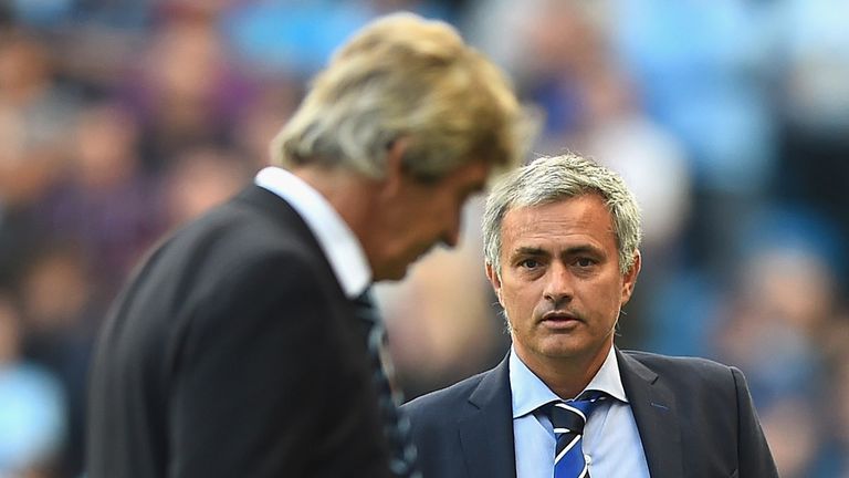 Jose Mourinho looks to Manuel Pellegrini