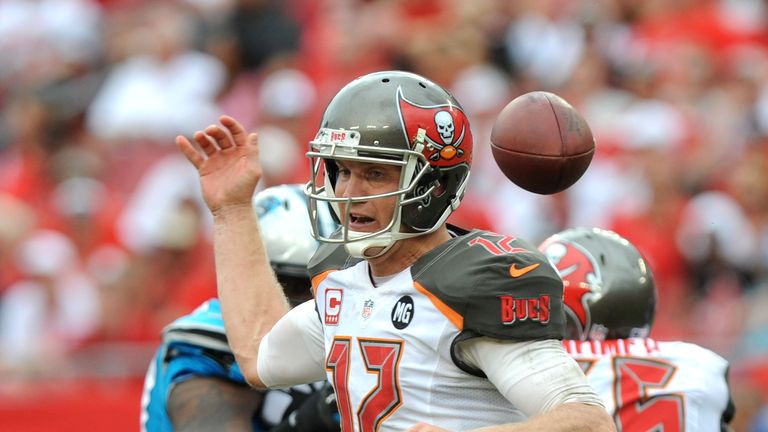 Tampa Bay Buccaneers quarterback Josh McCown loses control of the snap against the Carolina Panthers 