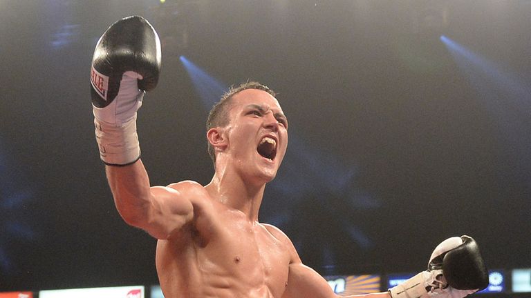 Josh Warrington celebrates beating Rendall Munroe  during the Commonwealth Featherweight Title bout at the Phones 4U Arena, Manches