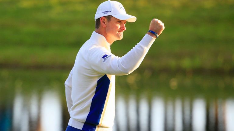 Justin Rose is happy with his putt on the second green as the sun comes out in Perthshire