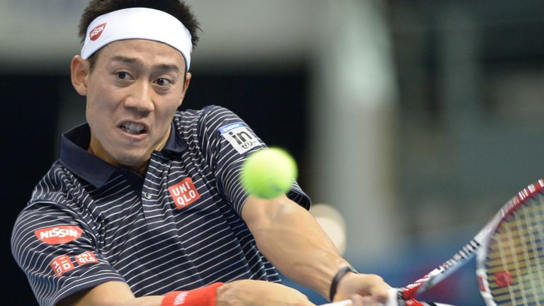 Kei Nishikori of Japan returns a shot in his win over Rajeev Ram in the second round of the Malaysian Open