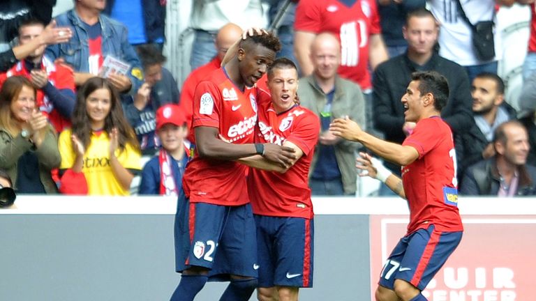 Lille forward Divock Origi celebrates