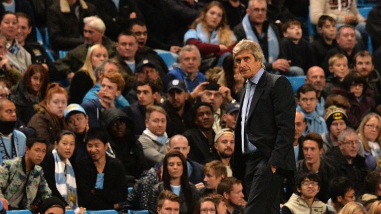 Manchester City's Chilean manager Manuel Pellegrini looks on during the English League Cup third round football match between Manchester City and Sheffield