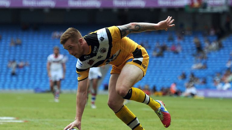 Castleford Tigers' Marc Sneyd runs over to score a try