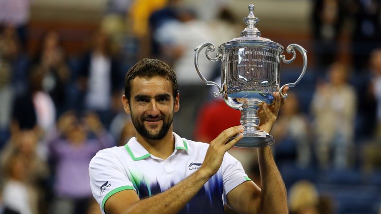 Marin Cilic celebrates with the trophy after winning the US Open