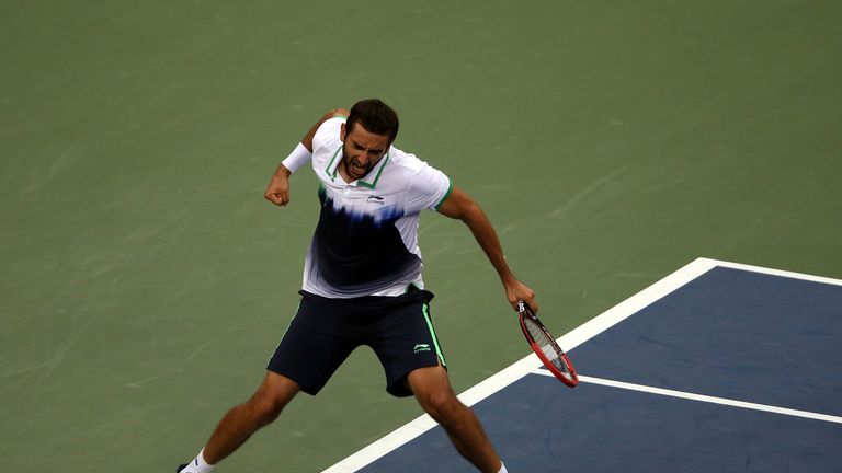 Marin Cilic reacts after a point in the US Open final