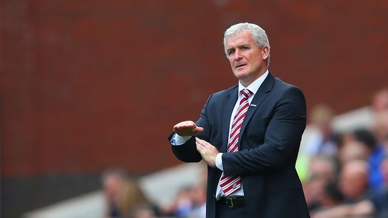 Manager Mark Hughes of Stoke City on the touchline during the Barclays Premier League match between Stoke City and Leicester