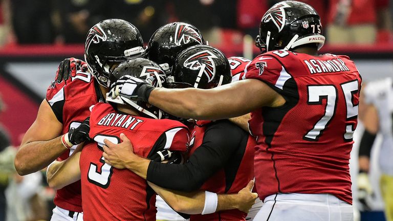 Matt Bryant of the Atlanta Falcons celebrates with the game winning field goal in overtime against Saints