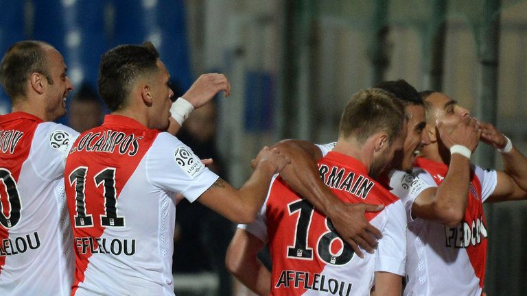 Monaco's players celebrate after scoring a goal during the French L1 football match between Montpellier and 