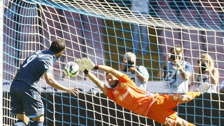 Chievo goalkeeper Francesco Bardi saves Gonzalo Higuain's penalty