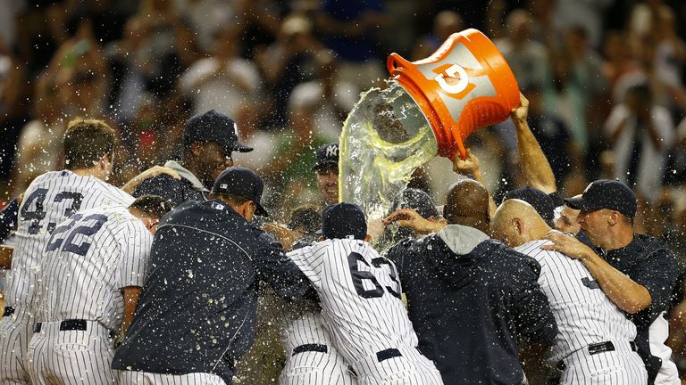 New York Yankees fans celebrate win over Cleveland Indians after