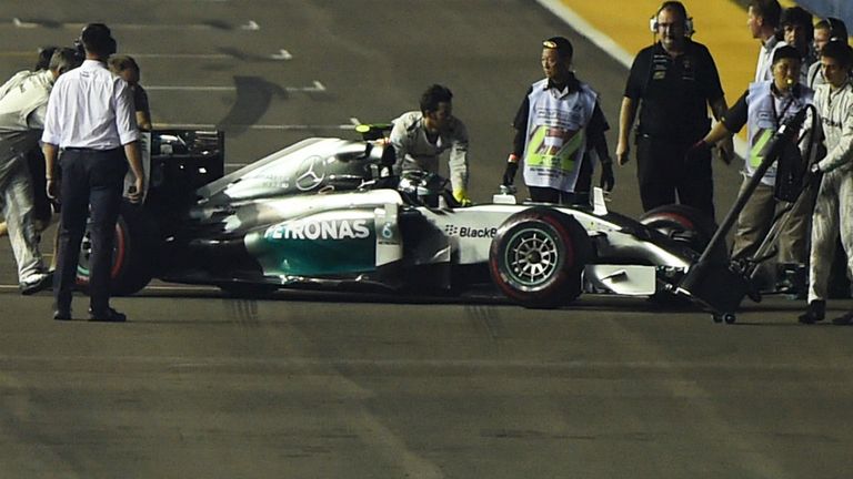 Nico Rosberg is pushed off the grid in Singapore