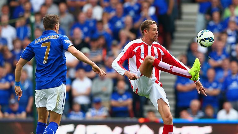 Peter Crouch controls the ball 