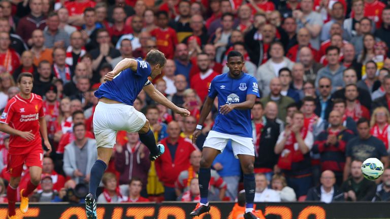 LIVERPOOL, ENGLAND - SEPTEMBER 27:  Phil Jagielka of Everton scores a late goal to level the scores at 1-1 during the Barclays Premier League match between