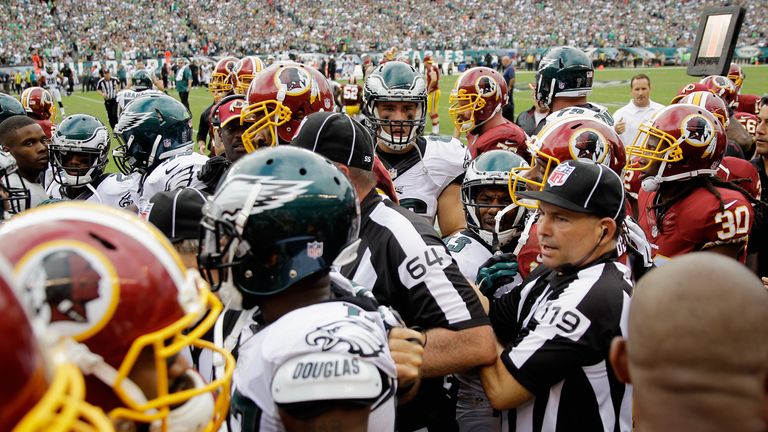 The Philadelphia Eagles and the Washington Redskins fight during the fourth quarter at Lincoln Financial Field