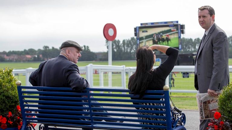 Spectators take their seats at the finish line during day three of the 2014 William Hill Ayr Gold Cup Festival at Ayr Racecourse, Ayr.