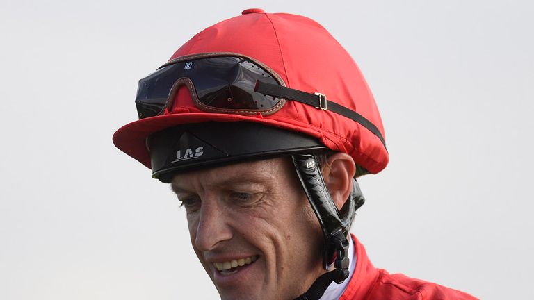 NEWMARKET, ENGLAND - SEPTEMBER 27:  Richard Hughes after riding Tiggy Wiggy to win The Connolly's Red Mills Cheveley Park Stakes at Newmarket.