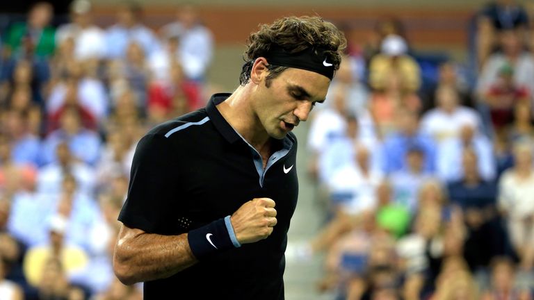 Roger Federer reacts to a point against Roberto Bautista Agut during their men's singles fourth round of the US Open