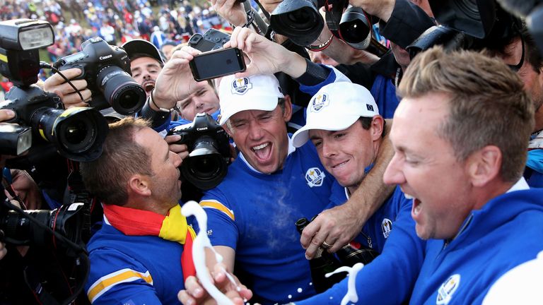 (L-R) Sergio Garcia, Lee Westwood, Rory McIlroy and Ian Poulter of Europe celebrate winning the Ryder Cup