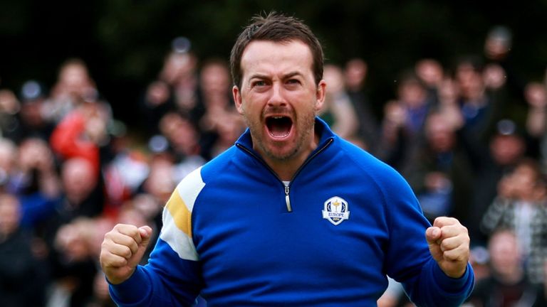 Europe's Graeme McDowell celebrates winning his singles match on day three of the 40th Ryder Cup at Gleneagles Golf Course, Perthshire.