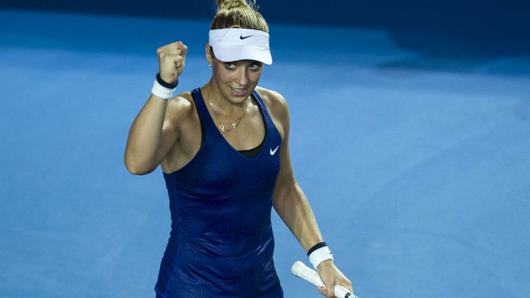 Sabine Lisicki celebrates after beating Francesca Schiavone at the Hong Kong Open 
