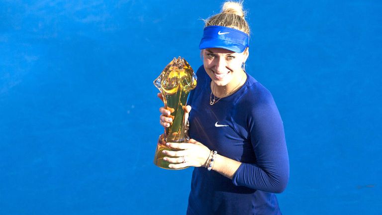 Sabine Lisicki poses with the trophy after winning the Hong Kong Tennis Open against Karolina Pliskova