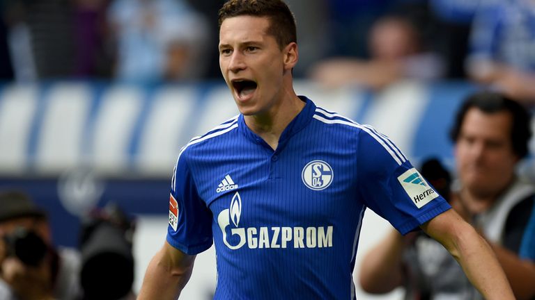Schalke's midfielder Julian Draxler celebrates after scoring during