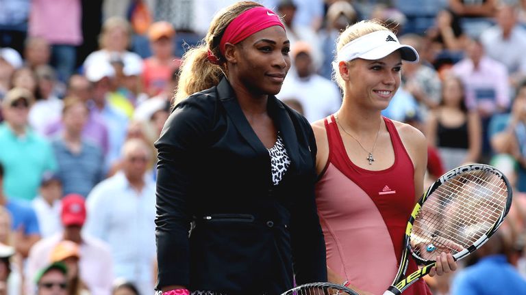 Serena Williams poses with Caroline Wozniacki at the US Open women's final 2014