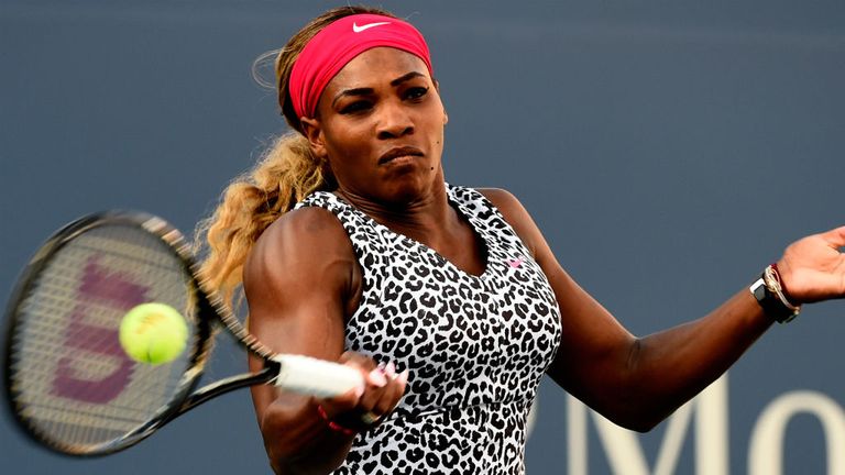 Serena Williams hits a forehand during her match against Caroline Wozniacki of Denmark at the US Open 2014
