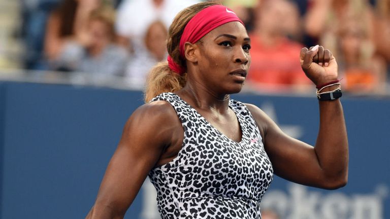 Serena Williams reacts during her match against Caroline Wozniacki during their 2014 US Open Women's Singles - final