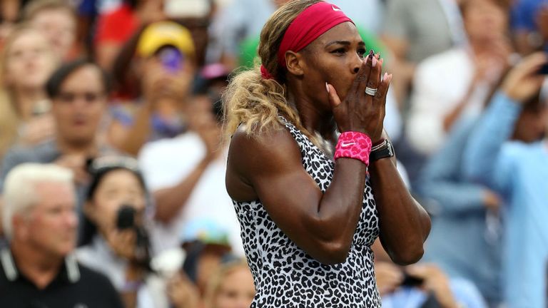 Serena Williams reacts to a point against Caroline Wozniacki at the US Open 2014