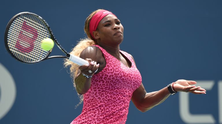 Serena Williams returns a shot to Kaia Kanepi during their  match at the US Open in New York