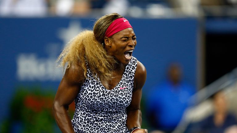 Serena Williams reacts against Flavia Pennetta during their women's singles quarterfinal match at the US Open
