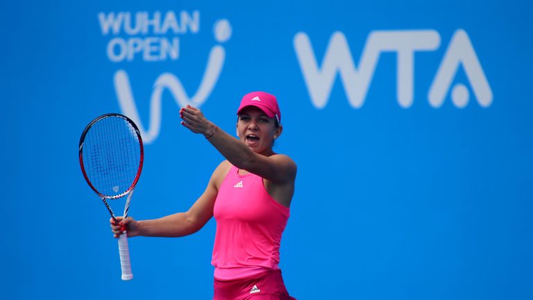 Simona Halep reacts during her defeat to defeat to Garbine Muguruza at the Wuhan Open