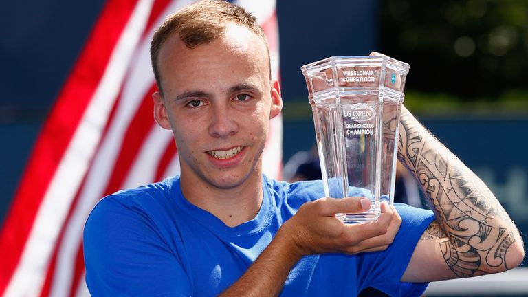NEW YORK, NY - SEPTEMBER 07:  Andy Lapthorne of Great Britain celebrates with the trophy after defeating David Wagner of the United States during the men's