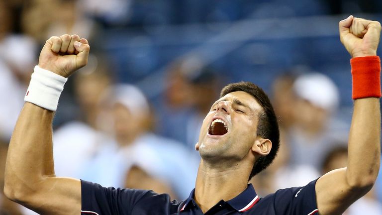 Novak Djokovic of Serbia celebrates after defeating Andy Murray of Great Britain in their men's singles quarterfinal match at the US Open.