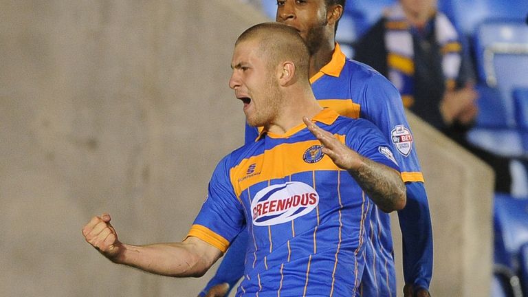 Shrewsbury Town's James Collins celebrates after scoring the opening goal of the game against Norwich City during the Capital One Cup Third Round match