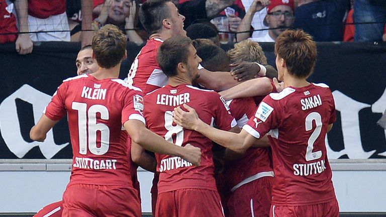 Stuttgart's players celebrate after a score during the German first division Bundesliga football match VfB 