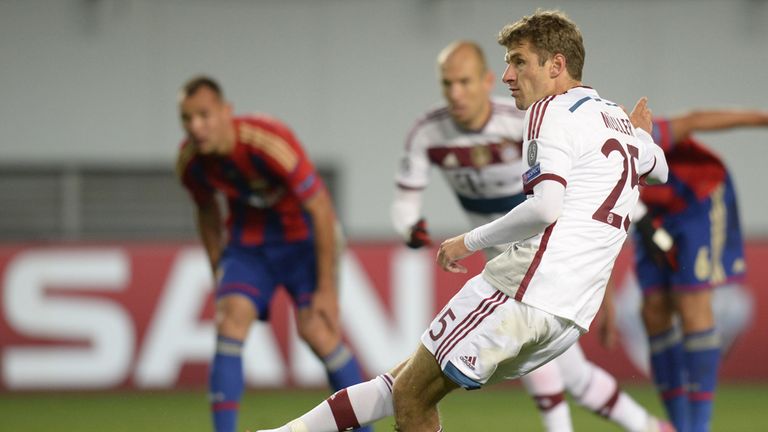 Bayern Munich's midfielder Thomas Mueller scores from the penalty spot 