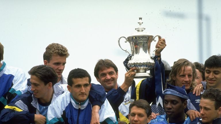 May 1991: Tottenham Hotspur captain Gary Mabbutt holds aloft the trophy on the bus after their victory over Nottingham Forest in the FA Cup Final in 1991