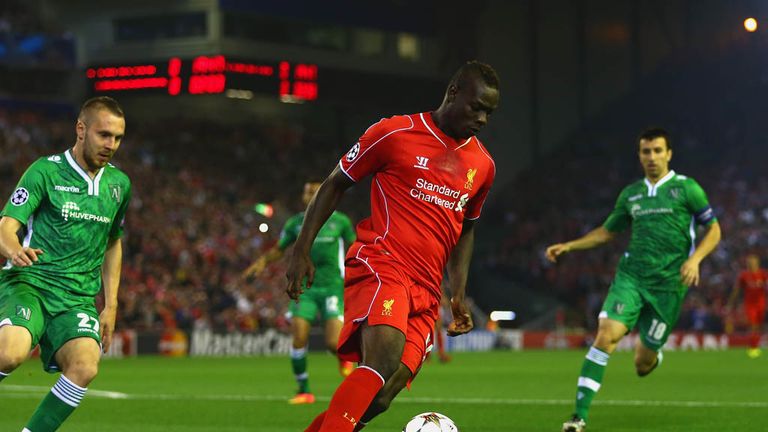 LIVERPOOL, ENGLAND - SEPTEMBER 16:  Mamadou Sakho of Liverpool is marshalled by Cosmin Moti of PFC Ludogorets Razgrad during the UEFA Champions League Grou