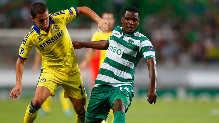 William Carvalho of Sporting Lisbon battles with Eden Hazard of Chelsea during the UEFA Champions League Group G match