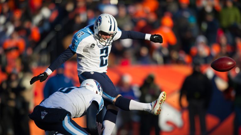 Kicker Rob Bironas of the Tennessee Titans kicks a second quarter extra point against Denver