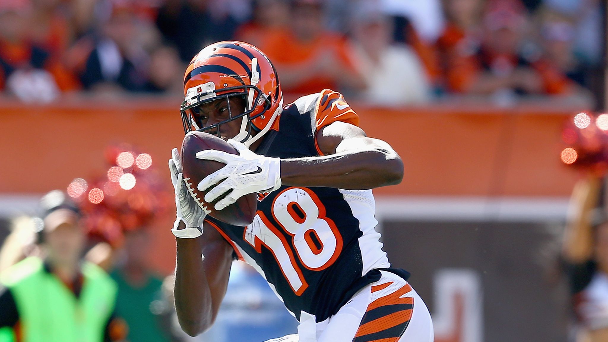 Cincinnati Bengals wide receiver A.J. Green (18) walks off the