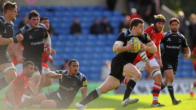 Falcons player Mark Wilson makes a break to set up the third try