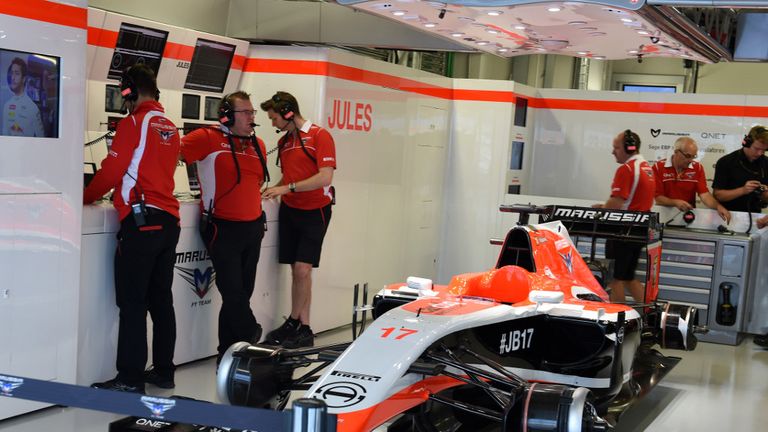 Tribute: Jules Bianchi's car stands in Marussia's garage
