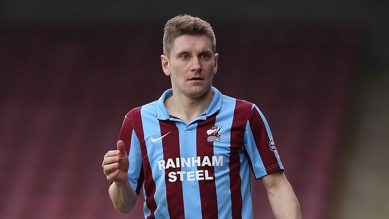 Andy Dawson of Scunthorpe United in action during the Sky Bet League Two match between Scunthorpe United and Northampton Town